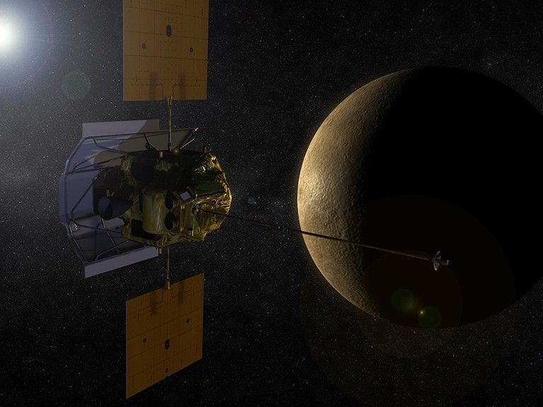 NASA MESSENGER spacecraft shown orbiting Mercury