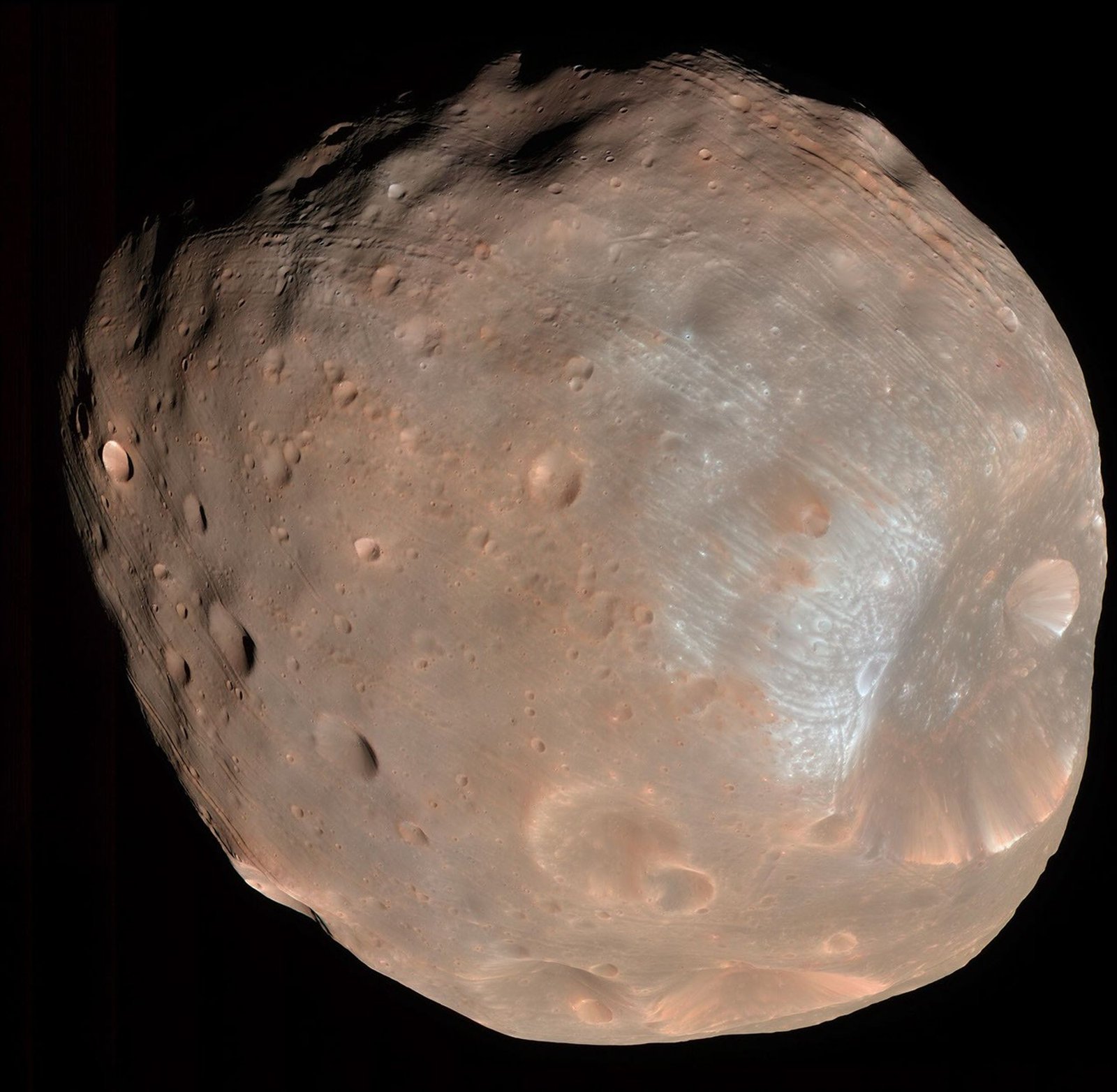 Mars: The Planet That Lost Its Oceans Real HiRISE photograph of Phobos, the larger moon of Mars, showing its irregular cratered surface and the large Stickney crater