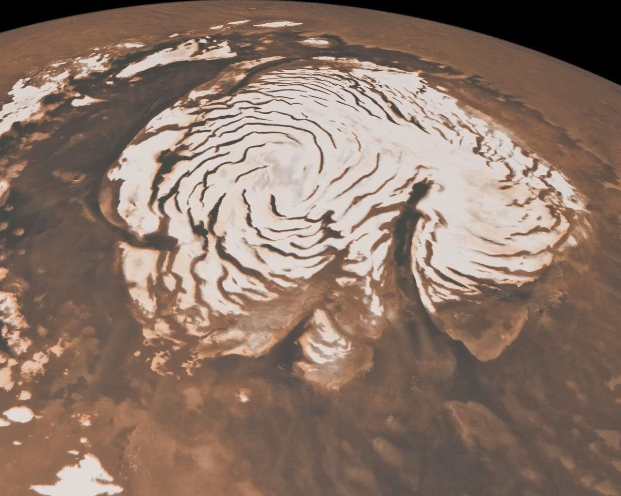 Mars: The Planet That Lost Its Oceans Real NASA orbital image of Mars's north polar ice cap, a bright white region roughly 1,000 kilometers across marked by dark spiral shaped troughs