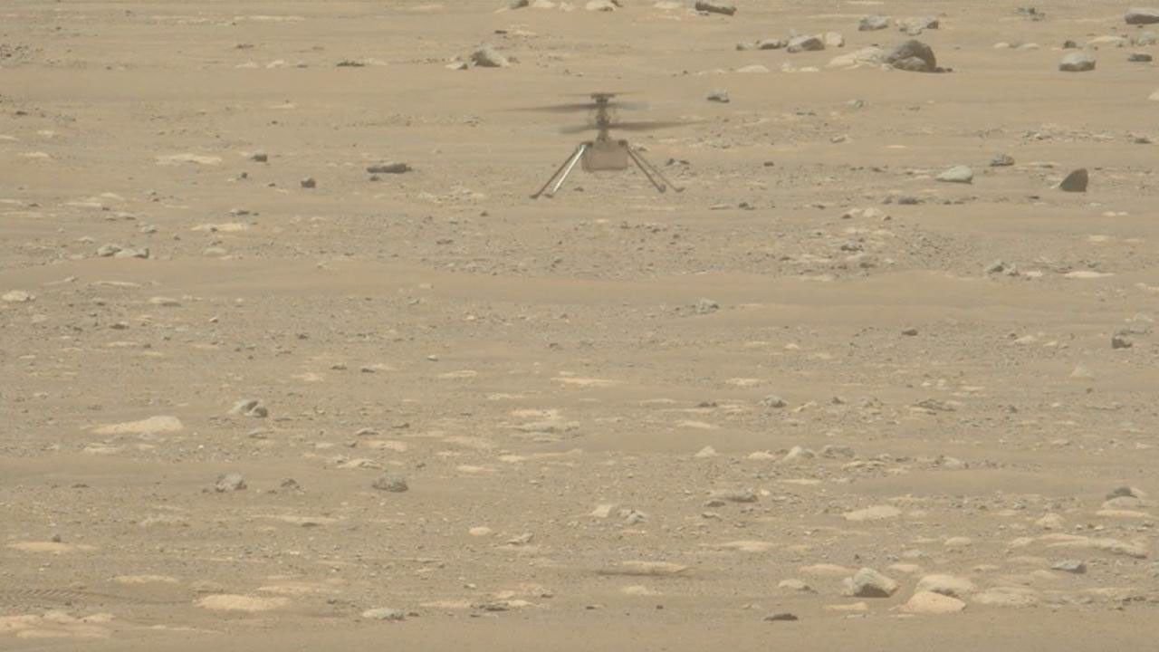 Mars: The Planet That Lost Its Oceans Real photograph from Perseverance's Mastcam-Z showing the Ingenuity helicopter airborne above the Martian surface during its historic first flight