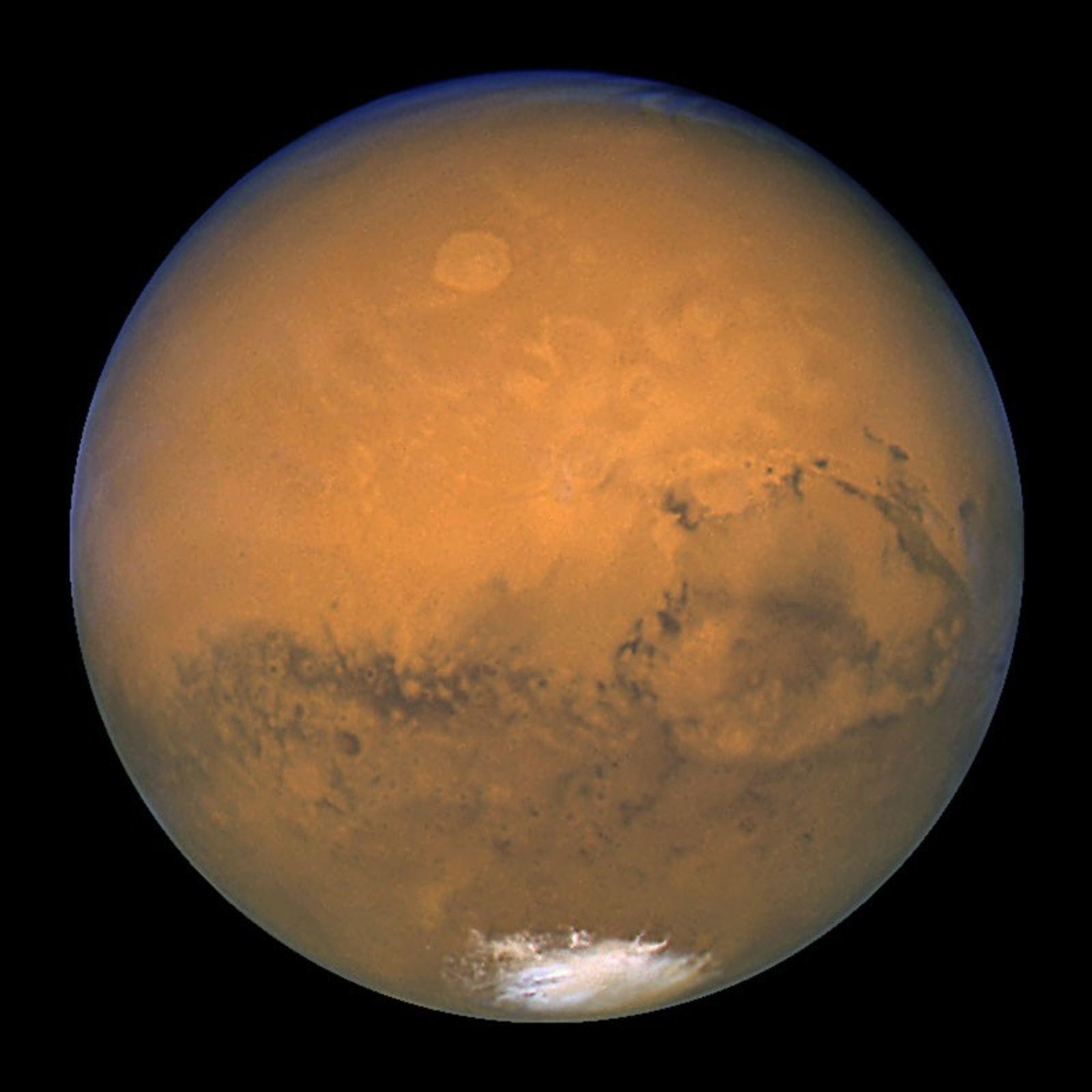 Mars: The Planet That Lost Its Oceans Sharp real color photograph of Mars taken by the Hubble Space Telescope in 2003 during its closest approach to Earth in nearly 60,000 years, showing Olympus Mons, Valles Marineris, and the southern polar ice cap