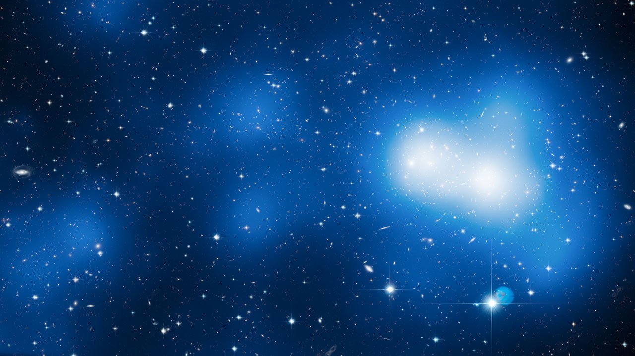 Dark Matter Might Not Be Matter at All: Inside the Theory That Gravity Is Leaking From a Parallel Universe A sixty million light year filament of dark matter mapped in three dimensions by the Hubble Space Telescope near galaxy cluster MACS J0717, shown as a blue mass overlay